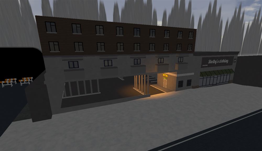 No Mercy turf, KTTG-held building exterior at night.